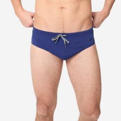 Slipki pływackie męskie Nabaiji 100 Plus. Niebieskie odzież kąpielowa NABAIJI, m, bez wzorów, z materiału, sportowe. Za 34.99 zł.
