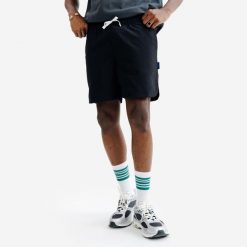 Spodenki płócienne męskie Elementals czarne. Czarne krótkie spodenki sportowe Decathlon, l, bez wzorów, z materiału. Za 79.99 zł.