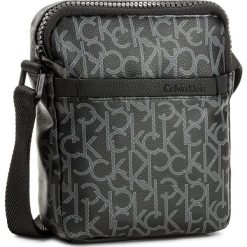 Saszetka CALVIN KLEIN BLACK LABEL - CK Mono Mini Reporter K50K503696 005. Saszetki i nerki marki Calvin Klein Black Label. W wyprzedaży za 249.00 zł.