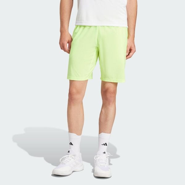 Szorty Tennis Ergo. Żółte krótkie spodenki sportowe Adidas, m, bez wzorów, z elastanu. Za 241.70 zł.