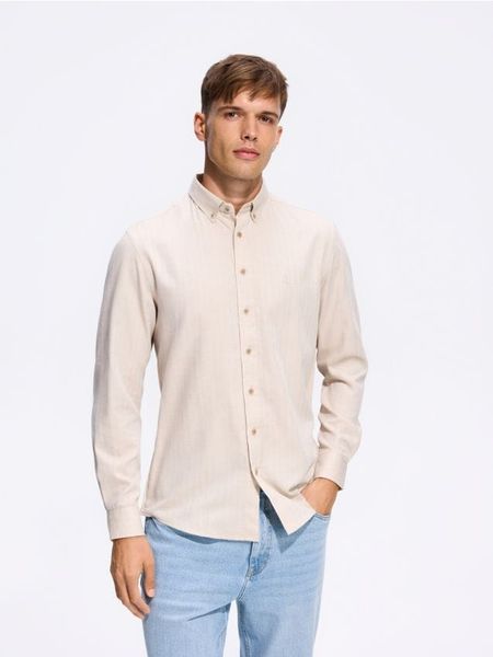 Koszula regular fit z bawełną - beżowy. Brązowe koszule Reserved, l, bez wzorów, z bawełny, bez kołnierzyka, bez ramiączek. Za 129.99 zł.