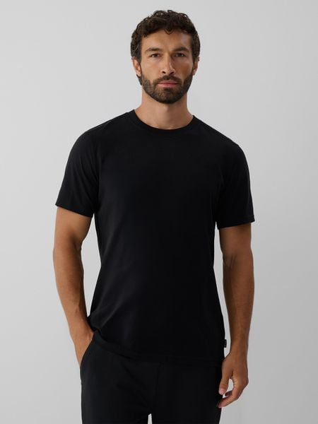 4F T-shirt regular z antybakteryjnym wykończeniem Polygiene męski - czarny XXL. Czarne t-shirty 4F, l, bez wzorów, z dzianiny, bez kołnierzyka, bez ramiączek. Za 69.99 zł.