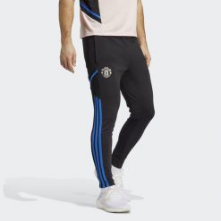 Spodnie do piłki noiżnej męskie Adidas Manchester United Condivo 22 Training. Czarne spodnie treningowe długie Adidas, m, bez wzorów, z dresówki. Za 270.70 zł.