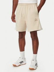 Adidas Szorty sportowe Adidas Kit 3-Stripes KW2385 Beżowy Loose Fit. Brązowe krótkie spodenki sportowe Adidas, m, bez wzorów, z bawełny. Za 199.99 zł.