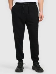 4F Spodnie dresowe w kolorze czarnym rozmiar: XL. Czarne spodnie treningowe długie 4F, xl, bez wzorów, z dresówki. Za 74.63 zł.