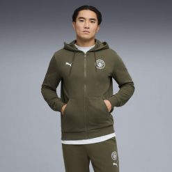 Męska bluza z kapturem Manchester City FtblCulture PUMA. Niebieskie bluzy Puma, m, bez wzorów, z bawełny, z kapturem. Za 214.00 zł.