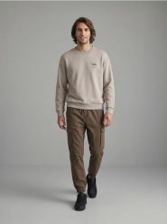Spodnie cargo jogger - brązowy. Brązowe joggery i bojówki Sinsay, bez wzorów. Za 59.99 zł.