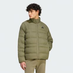 KURTKA OCIEPLANA ESSENTIALS PACKABLE. Brązowe kurtki Adidas, l, bez wzorów, z materiału, bez kaptura. Za 349.00 zł.