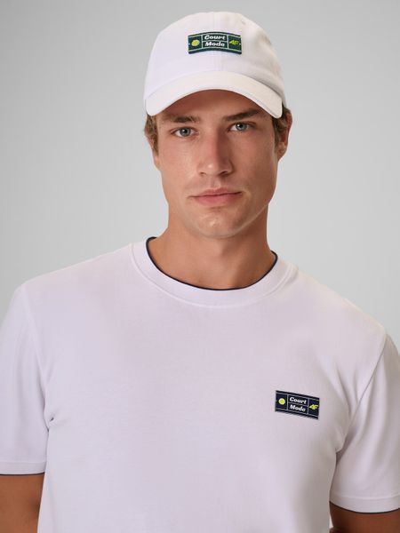 4F Czapka z daszkiem strapback męska - biała L/XL (60cm). Białe czapki z daszkiem 4F, z aplikacjami, z bawełny. Za 69.99 zł.