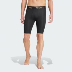 Legginsy TECHFIT Compression Training Short. Czarne legginsy długie sportowe Adidas, l, bez wzorów, z materiału, na fitness i siłownię, techfit (adidas). Za 139.00 zł.