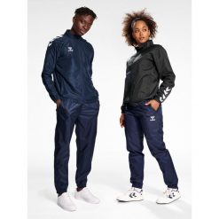 Bieganie Hummel All-weather. Niebieskie szorty Hummel, xl, bez wzorów, z materiału, sportowe. Za 233.50 zł.