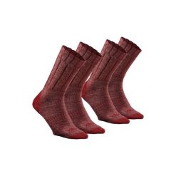 Skarpety turystyczne SH100 warm mid. Czerwone skarpety QUECHUA, bez wzorów, z elastanu. Za 29.99 zł.