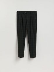 Garniturowe spodnie w kratę - czarny. Czarne garnitury Reserved, bez wzorów, z tkaniny. Za 169.99 zł.