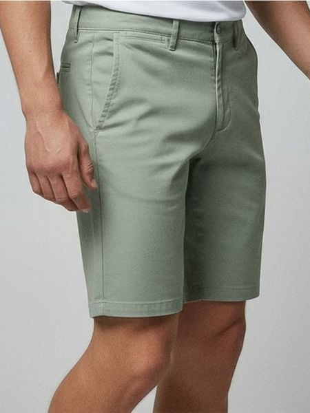 Szorty chino - zielony. Zielone krótkie spodenki sportowe Sinsay, l, bez wzorów. W wyprzedaży za 29.99 zł.