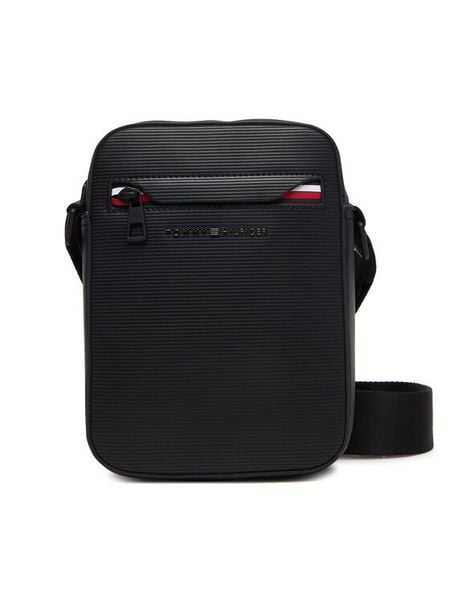 Tommy Hilfiger Saszetka Th Corp Mini Reporter AM0AM14020 Czarny. Czarne saszetki i nerki Tommy Hilfiger, bez wzorów, ze skóry. Za 369.99 zł.