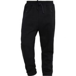 Adidas Originals Spodnie treningowe black. Spodnie treningowe długie marki adidas Originals. W wyprzedaży za 246.75 zł.