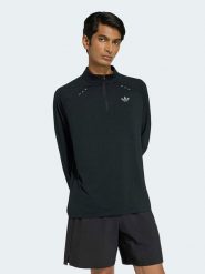 Adidas Koszulka funkcyjna w kolorze czarnym rozmiar: XL. Czarne t-shirty sportowe Adidas, bez wzorów, z materiału, bez ramiączek, outdoorowe. Za 109.95 zł.