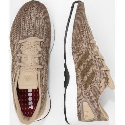 Adidas Performance PUREBOOST DPR Obuwie do biegania treningowe raw gold/trace olive. Buty do biegania marki adidas Performance, z materiału. W wyprzedaży za 389.35 zł.