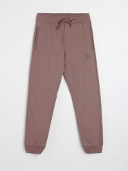 Spodnie jogger - green spruce. Zielone joggery i bojówki Sinsay, l, bez wzorów. Za 49.99 zł.
