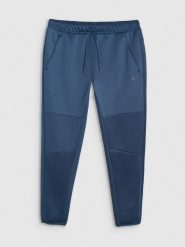 4F Spodnie sportowe w kolorze granatowym rozmiar: M. Niebieskie spodnie treningowe długie 4F, m, bez wzorów, z materiału. Za 117.73 zł.