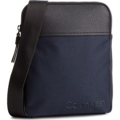 Saszetka CALVIN KLEIN - Vault Flat Crossover K50K504282 068. Saszetki i nerki marki CALVIN KLEIN. W wyprzedaży za 279.00 zł.