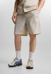Spodenki sportowe męskie Prosto Club. Brązowe krótkie spodenki sportowe Prosto., l, z aplikacjami, z nylonu. Za 274.99 zł.