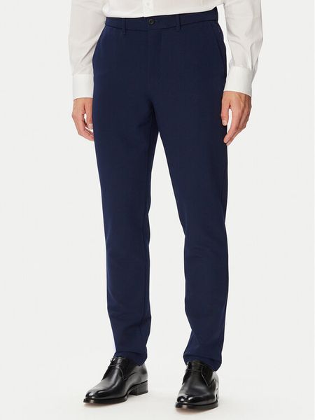 Tommy Hilfiger Chinosy Harlem MW0MW44675 Granatowy Regular Fit. Niebieskie eleganckie spodnie Tommy Hilfiger, m, z syntetyku. Za 569.99 zł.