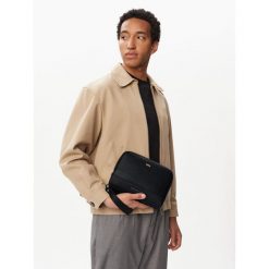 Saszetka Tommy Hilfiger. Czarne saszetki i nerki Tommy Hilfiger, bez wzorów. Za 329.99 zł.
