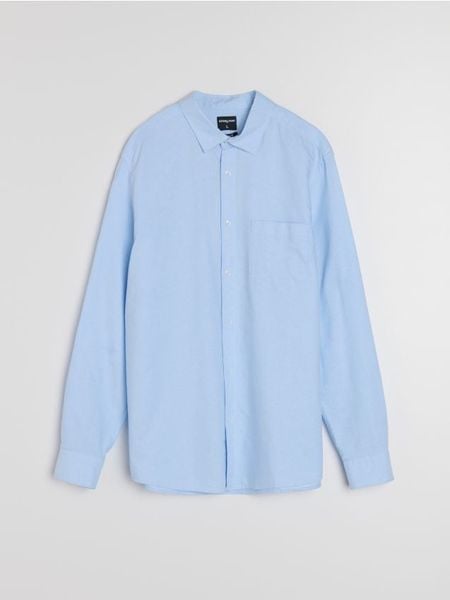 Bawełniana koszula z długim rękawem i kieszenią piersiową - błękitny. Niebieskie koszule Sinsay, l, bez wzorów, z bawełny, bez kołnierzyka, bez ramiączek. Za 59.99 zł.