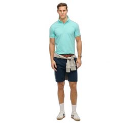 Koszulka polo Piqué Superdry City. Niebieskie koszulki polo Superdry, m, bez wzorów, z tkaniny, bez kołnierzyka, bez ramiączek. Za 181.85 zł.