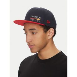Czapka z daszkiem New Era. Niebieskie czapki z daszkiem New Era, bez wzorów. Za 129.99 zł.