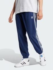 Adidas Spodnie dresowe w kolorze granatowym rozmiar: S. Niebieskie spodnie treningowe długie Adidas, s, bez wzorów, z dresówki. Za 118.01 zł.