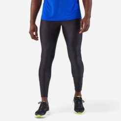 Legginsy do biegania męskie Kiprun Run 100 Dry. Czarne legginsy długie sportowe KIPRUN, l, bez wzorów, z materiału, do biegania. Za 59.99 zł.