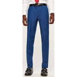 Spodnie garniturowe slim fit - Niebieski. Eleganckie spodnie marki Reserved. Za 149.99 zł.