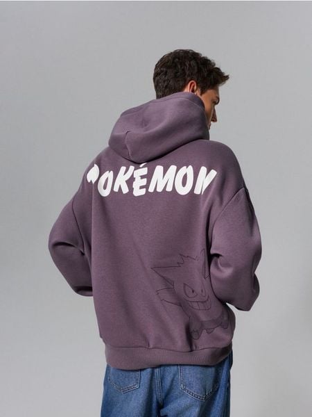 Bluza hoodie z nadrukiem Pokemon - fioletowy. Fioletowe bluzy bez kaptura Sinsay, l, bez wzorów, bez kaptura. Za 79.99 zł.