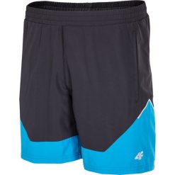 Spodenki męskie SKMF004 - niebieski jasny. Krótkie spodenki sportowe marki 4F. W wyprzedaży za 79.99 zł.