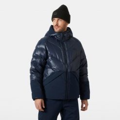 Kurtka puchowa Helly Hansen Village Down. Niebieskie kurtki Helly Hansen, m, bez wzorów, z puchu, bez kaptura. W wyprzedaży za 1,398.50 zł.