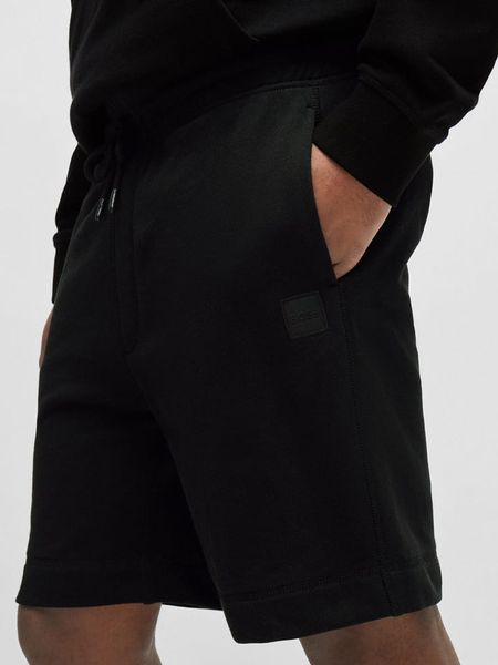 Hugo Boss Underwear Szorty dresowe w kolorze czarnym rozmiar: L. Czarne krótkie spodenki sportowe Hugo Boss Underwear, l, bez wzorów, z bawełny. Za 241.95 zł.