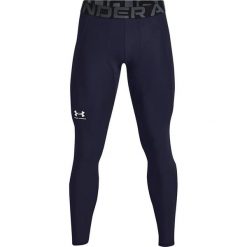 Legginsy Under Armour Heatgear® Armour. Białe legginsy długie sportowe Under Armour, bez wzorów, na fitness i siłownię. Za 222.50 zł.