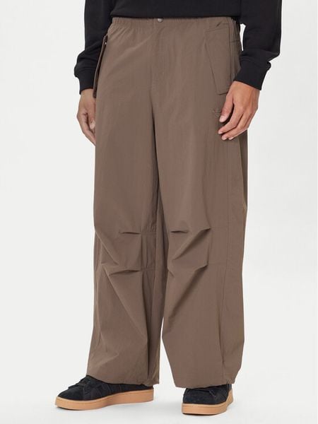 Adidas Spodnie materiałowe Premium Essentials Utility Parachute JW1087 Brązowy Loose Fit. Brązowe spodnie materiałowe Adidas, m, bez wzorów, z materiału. Za 258.99 zł.