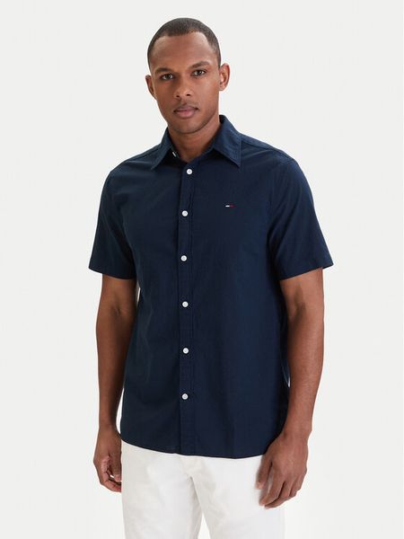 Tommy Jeans Koszula DM0DM22786 Granatowy Regular Fit. Niebieskie koszule Tommy Jeans, m, bez wzorów, z bawełny, bez kołnierzyka, bez ramiączek. Za 309.99 zł.