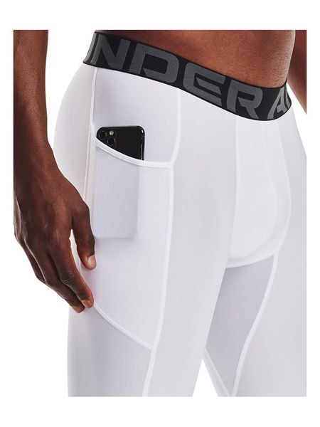 Under Armour Szorty sportowe w kolorze białym rozmiar: XL. Białe krótkie spodenki sportowe Under Armour, xl, bez wzorów, z materiału. Za 124.11 zł.