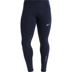 Nike Performance POWER RUNNING Legginsy obsidian/silver. Spodnie treningowe długie marki Nike Performance, z elastanu. Za 189.00 zł.