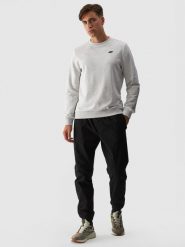 4F Spodnie casual joggery męskie - czarne M. Czarne joggery i bojówki 4F, na co dzień, l, bez wzorów, z bawełny, casualowe. W wyprzedaży za 99.99 zł.