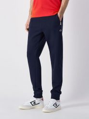 Champion Spodnie dresowe w kolorze granatowym rozmiar: L. Niebieskie spodnie treningowe długie Champion, l, bez wzorów, z dresówki. Za 114.44 zł.