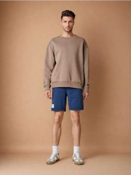 Szorty dresowe - granatowy. Niebieskie krótkie spodenki sportowe Sinsay, l, z aplikacjami, z dresówki. Za 39.99 zł.