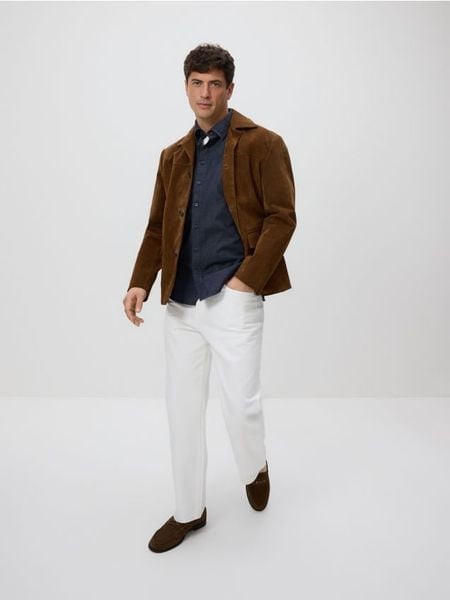 Jeansowa koszula slim fit - granatowy. Niebieskie koszule Reserved, l, bez wzorów, z denimu, bez kołnierzyka, bez ramiączek. Za 129.99 zł.