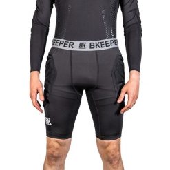 Wyściełana kompresja bramkarska pod spodenkami. Czarne odzież kompresyjna BKEEPER, s, bez wzorów, sportowe. Za 255.50 zł.