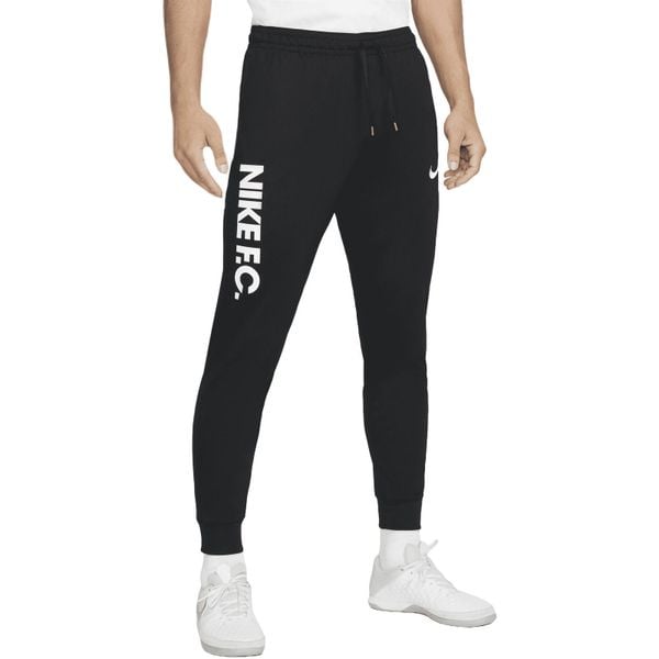 Spodnie Nike FC, Mężczyźni. Czarne spodnie treningowe długie Nike, m, bez wzorów, z dresówki. Za 283.35 zł.