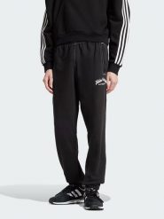 Adidas Spodnie dresowe w kolorze czarnym rozmiar: L. Czarne spodnie treningowe długie Adidas, l, bez wzorów, z bawełny. Za 152.98 zł.